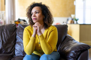 A depressed and worried woman.